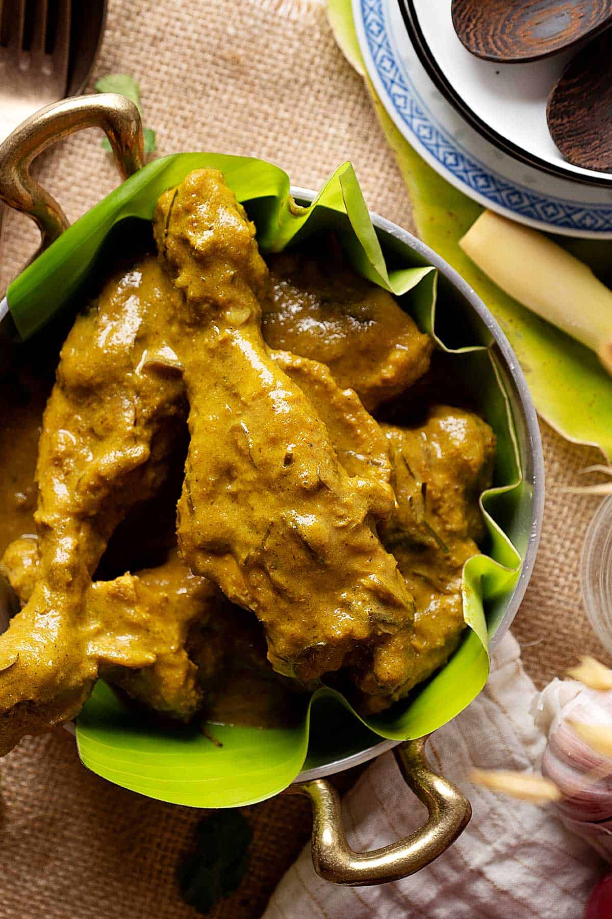 Slow cooker chicken rendang in a plate view from top